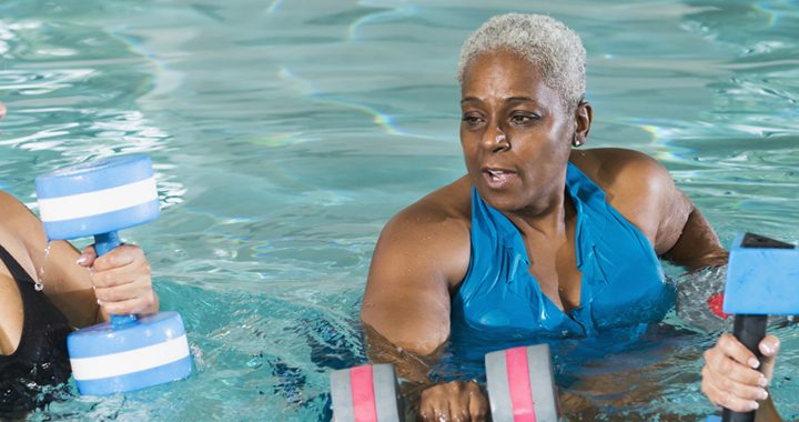 three women exercise with weights in a pool _ top exercises to do in the water