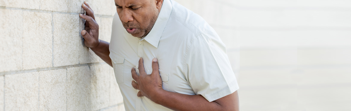 man touches his chest because of chest pain _ surviving a heart attack blog from mercy health