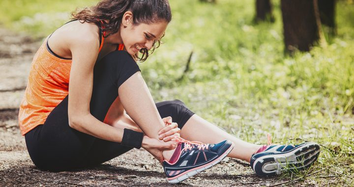 A woman experiencing ankle pain.