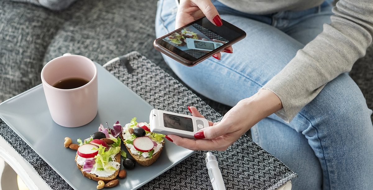 A person with diabetes monitoring their blood sugar levels.