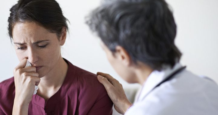 Female physician counseling patient on anxiety and stress