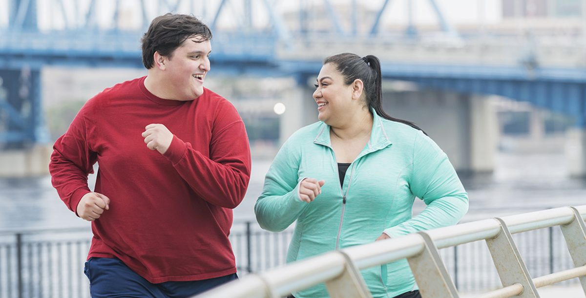 Two people staying active to boost their metabolism.