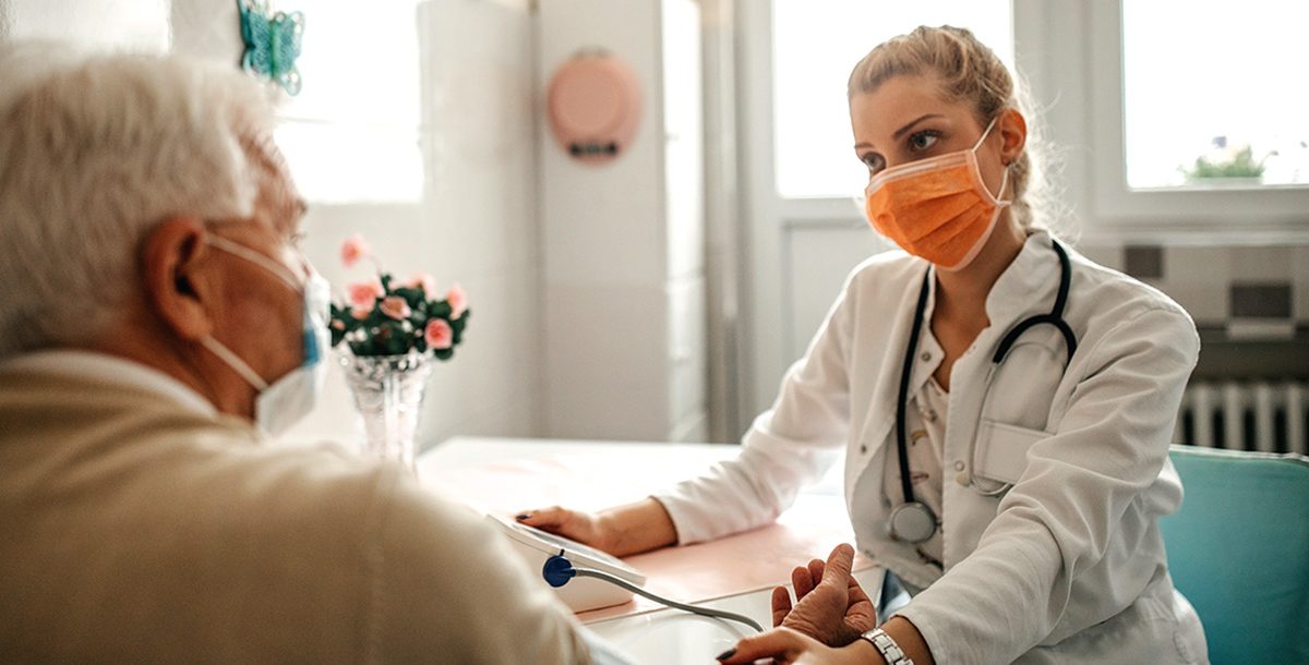 A patient meeting with their primary care provider.