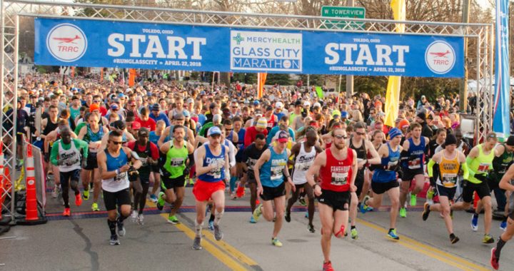 Runners taking off from the starting line at the Toledo Glass City Marathon