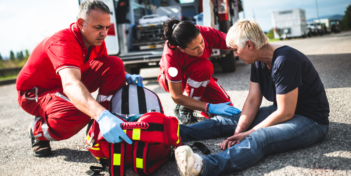 EMS team responds to a medical emergency outside in a parking lot