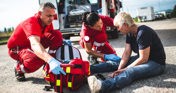 EMS team responds to a medical emergency outside in a parking lot