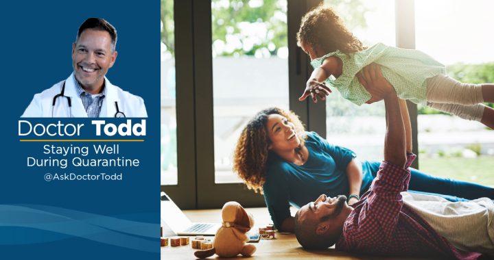 A family enjoying time together playing indoors.