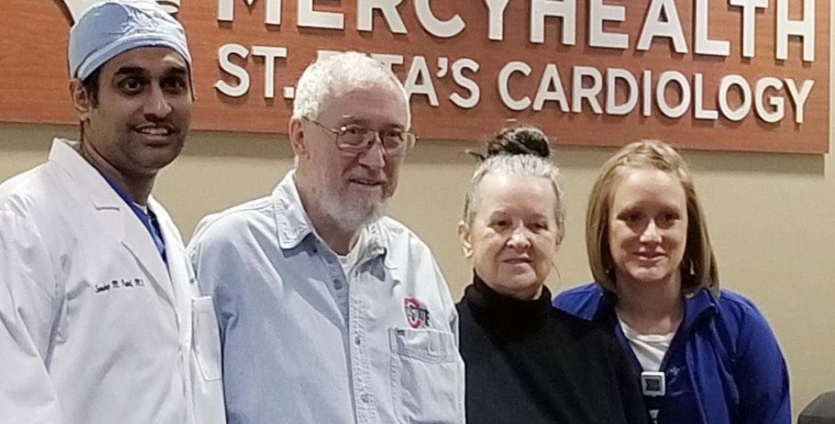 Russell McNeeley with his physician and staff members at Mercy Health - St. Rita's Medical Center.