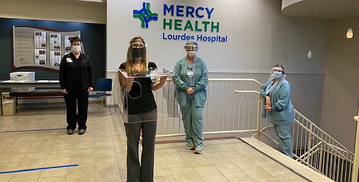 Health care workers at Lourdes Hospital with their PPE donations.