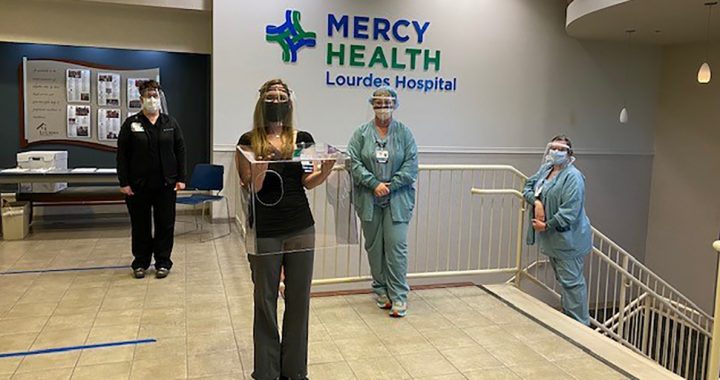 Health care workers at Lourdes Hospital with their PPE donations.