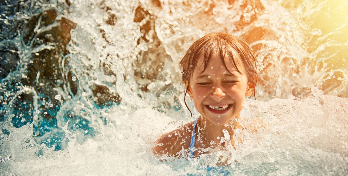 Girl swimming in water during the summer