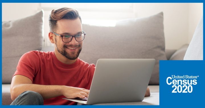 A man filling out his 2020 Census online at home.