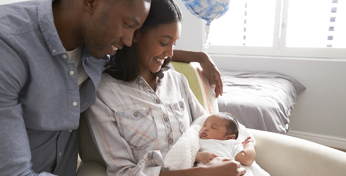 New parents caring for their newborn,