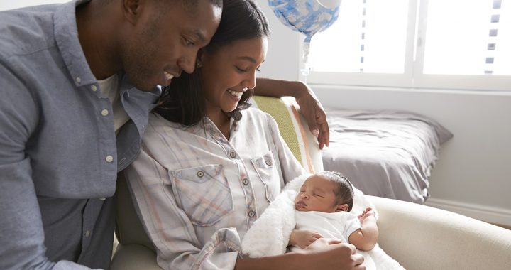 New parents caring for their newborn,