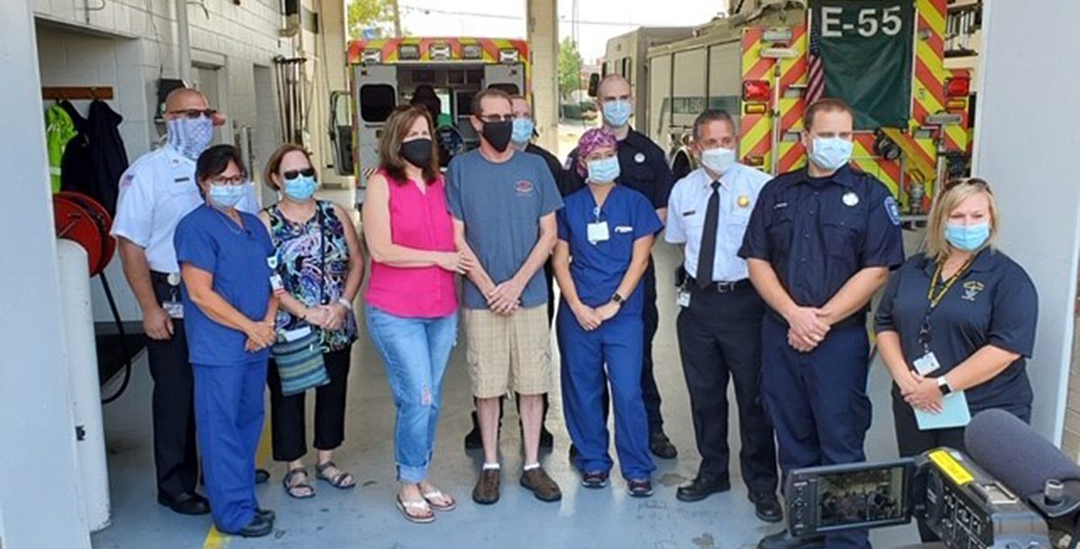 Mark Wiley and his wife with his Mercy Health - West Hospital care team.