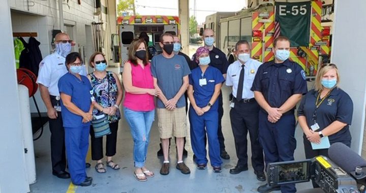 Mark Wiley and his wife with his Mercy Health - West Hospital care team.