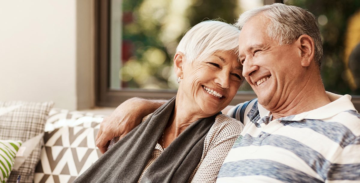 An older couple discussing lung cancer screenings