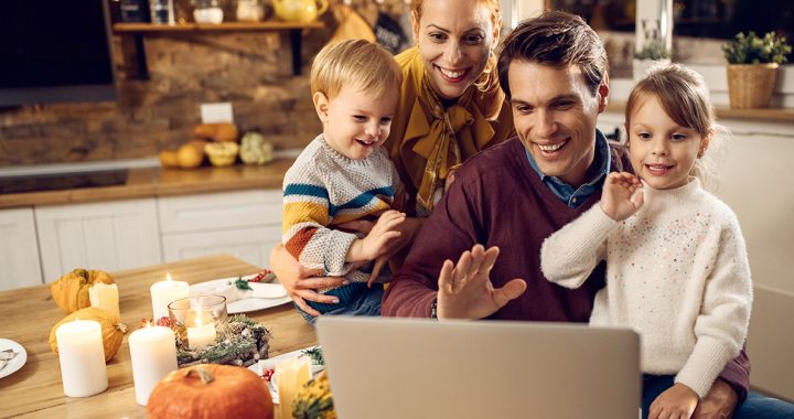 A family celebrating Thanksgiving with loved ones virtually