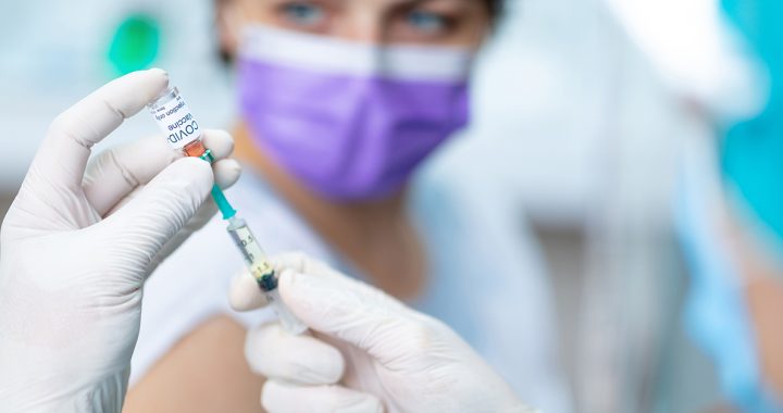 A person receiving the COVID-19 vaccine.