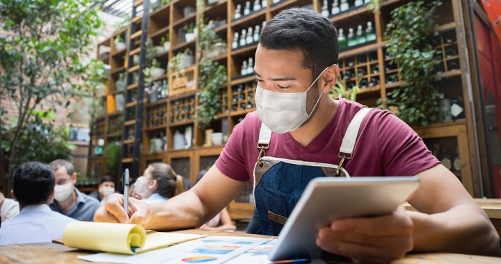 A man wearing a face mask in public.