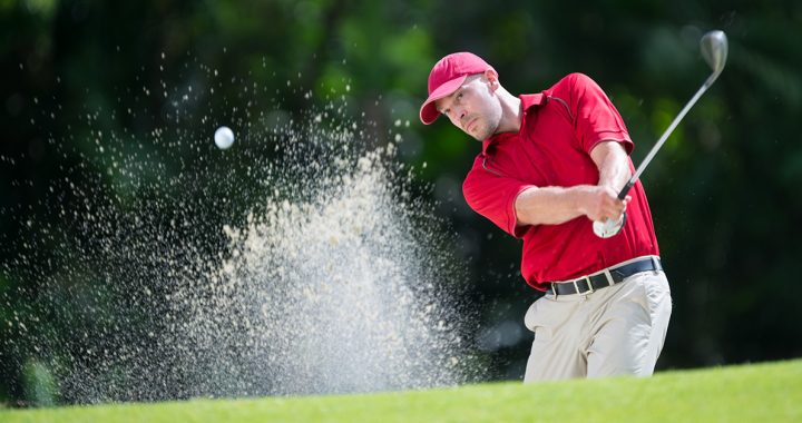 A man playing a round of golf.