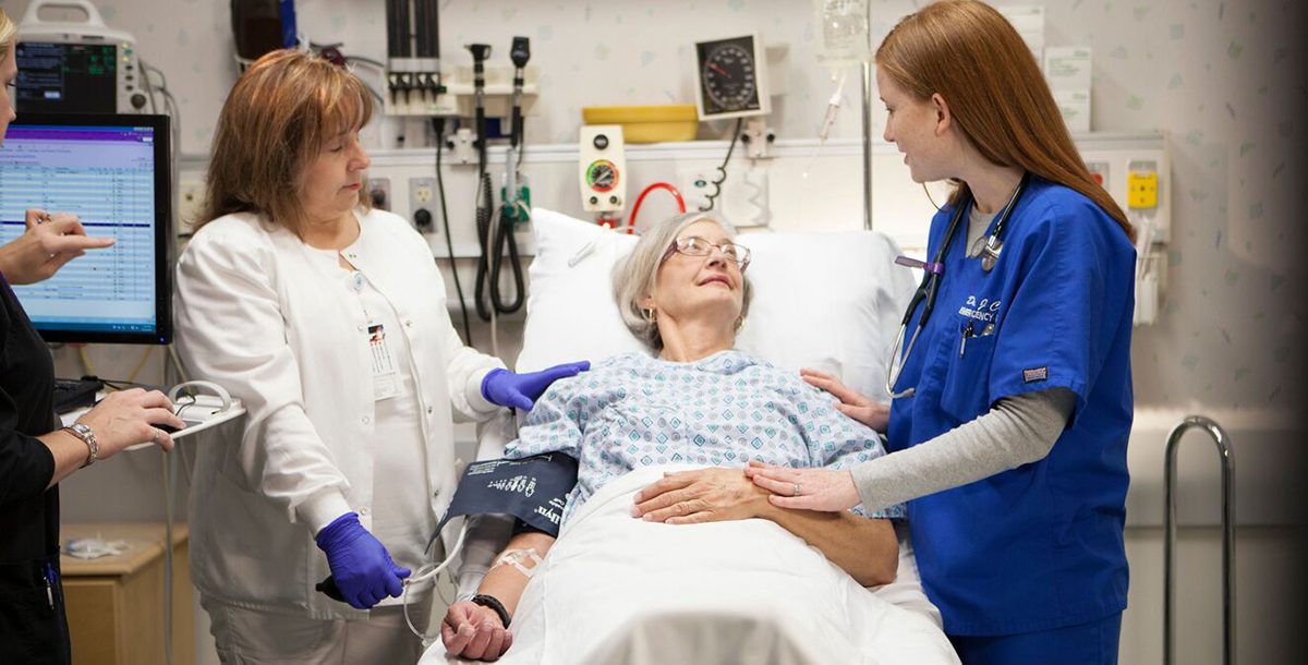 Nurses caring for a patient