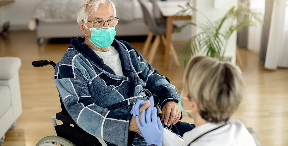 A stroke caregiver assisting their loved one.