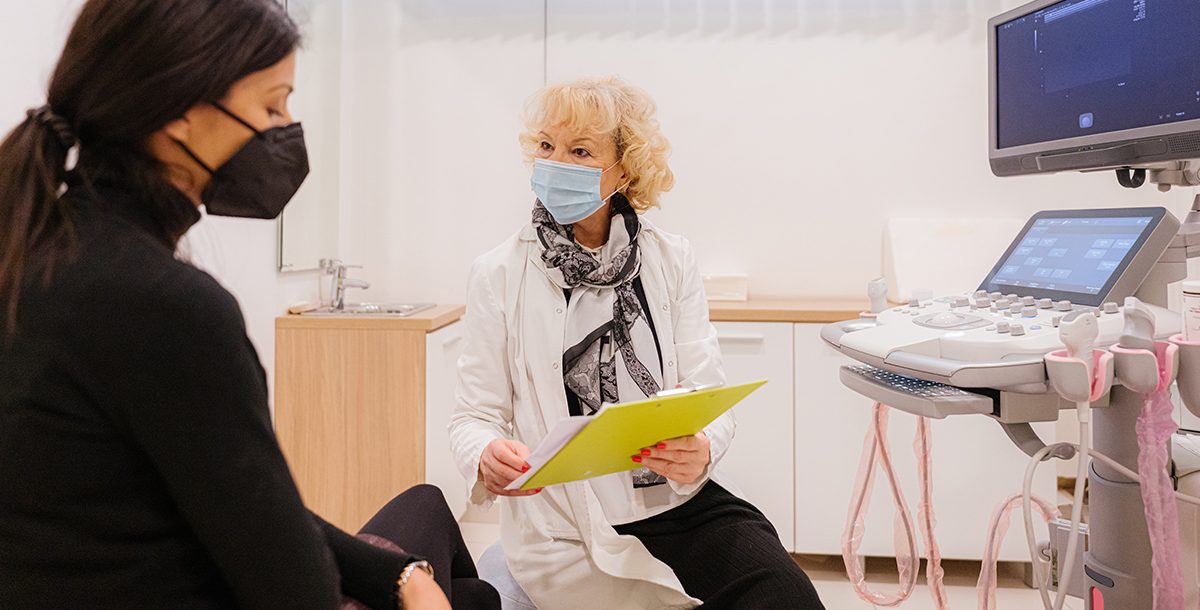 A woman undergoing a breast cancer screening