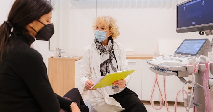 A woman undergoing a breast cancer screening