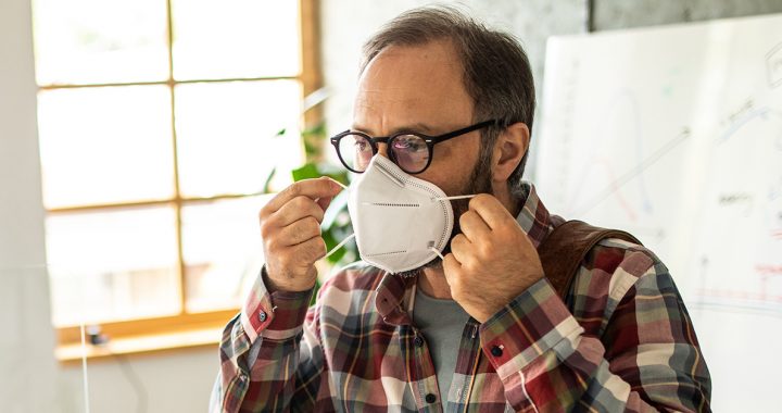 A man wearing a N95 mask