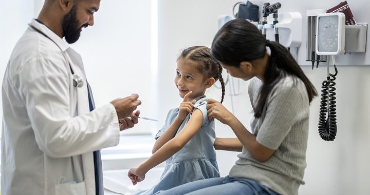 a kid getting their flu shot